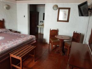 Postel nebo postele na pokoji v ubytování State Inn