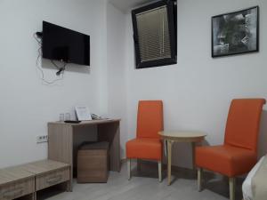 TV a/nebo společenská místnost v ubytování Hotel Old Konak