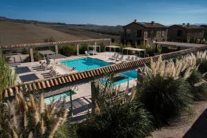 an overhead view of a swimming pool in a house at Tuscany Forever Apartments 1 in Volterra
