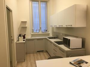 Kuchyňa alebo kuchynka v ubytovaní Duomo apartment