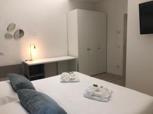 Posteľ alebo postele v izbe v ubytovaní Duomo apartment