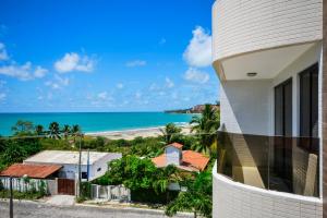 a view of the beach from a house at Costa Bella Residence in Conde