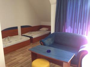 Postel nebo postele na pokoji v ubytování Complex Astra