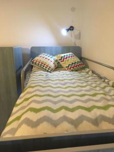 Postel nebo postele na pokoji v ubytování Rolling Stone Hostel