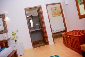 Um banheiro em Kurumba Villas