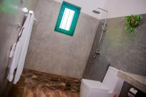 Um banheiro em Kurumba Villas