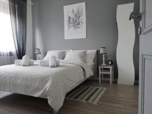 Posteľ alebo postele v izbe v ubytovaní Dub Apartments Zagreb - free parking