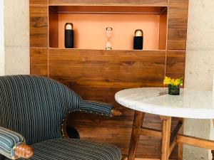 Posezení v ubytování Hotel Herencia By Hosting House