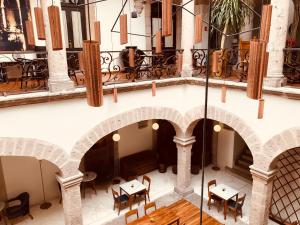 Posezení v ubytování Hotel Herencia By Hosting House
