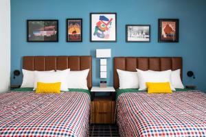 Posteľ alebo postele v izbe v ubytovaní Uptown Suites Extended Stay Austin TX - Downtown