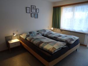 Postel nebo postele na pokoji v ubytování Apartments Carmena