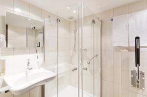 Ein Badezimmer in der Unterkunft Hotel Olten Swiss Quality