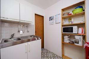 Kuchyňa alebo kuchynka v ubytovaní Apartments Jasminka
