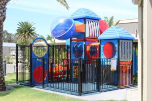 a playground with a playset in a park at Highway 1 Holiday & Lifestyle Park in Bolivar