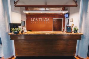 un bar en los tulsos hotel hygas en Hosteria Los Tilos en Villa Carlos Paz