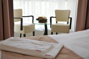 Katil atau katil-katil dalam bilik di Hotel Zeder Garni