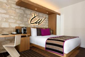 Postel nebo postele na pokoji v ubytování Select Hotel