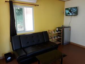 TV a/nebo společenská místnost v ubytování Elephant & Castle
