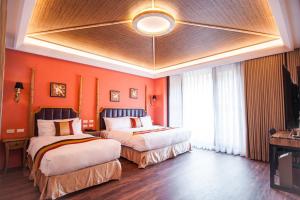 Letto o letti in una camera di Dreamer Boutique Hotel
