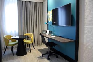 TV a/nebo společenská místnost v ubytování Best Western Hotel Cristallo