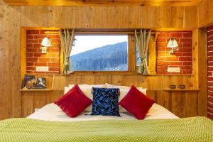Postel nebo postele na pokoji v ubytování Zostel Homes Cheog (Shimla)