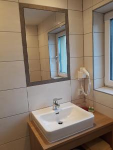 Koupelna v ubytování Hotel Jagdhof