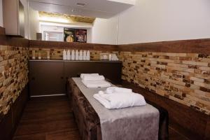 Posteľ alebo postele v izbe v ubytovaní Hotel Praha