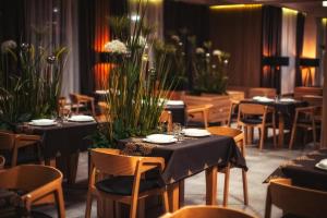Reštaurácia alebo iné gastronomické zariadenie v ubytovaní Hotel Zakopane Wellness & SPA ex Korona Tatr