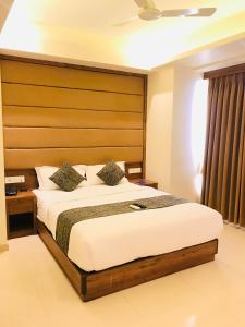 Postel nebo postele na pokoji v ubytování Hotel West Blue