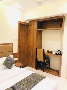 Postel nebo postele na pokoji v ubytování Hotel West Blue