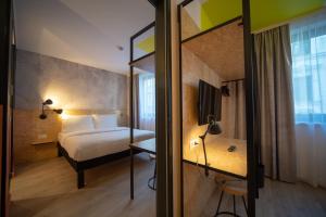 Rúm í herbergi á ibis Styles Wien Messe Prater
