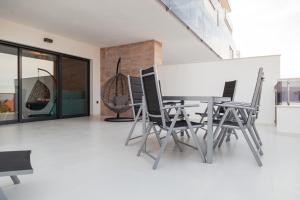 A seating area at Apartment Vistamar II