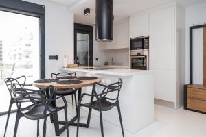 A kitchen or kitchenette at Apartment Vistamar II