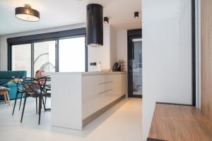 A kitchen or kitchenette at Apartment Vistamar II