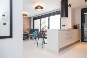 A kitchen or kitchenette at Apartment Vistamar II