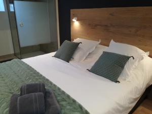 Postel nebo postele na pokoji v ubytování Ferme Houard