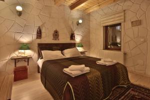 Postel nebo postele na pokoji v ubytování Days inn Cappadocia + 37 fotografií