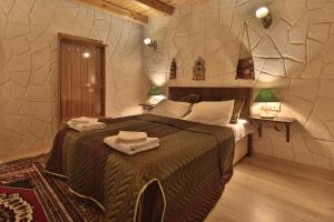 Postel nebo postele na pokoji v ubytování Days inn Cappadocia