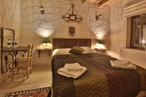 Postel nebo postele na pokoji v ubytování Days inn Cappadocia