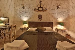 Postel nebo postele na pokoji v ubytování Days inn Cappadocia