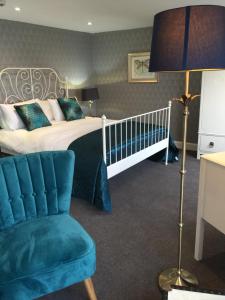 Postel nebo postele na pokoji v ubytování Lamlash Bay Hotel