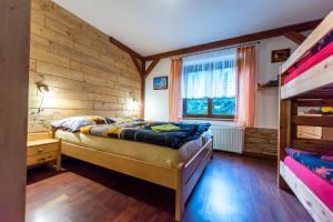 Postel nebo postele na pokoji v ubytování Apartmány Domino