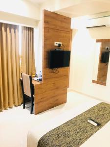 TV a/nebo společenská místnost v ubytování Hotel West Blue