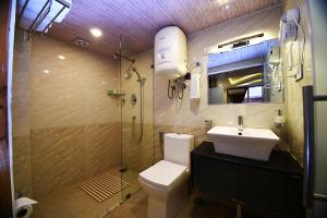 Kylpyhuone majoituspaikassa Hotel Jampa