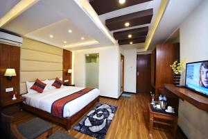 Letto o letti in una camera di Hotel Jampa