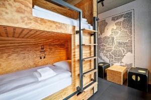 Postel nebo postele na pokoji v ubytování H.ostel Münster