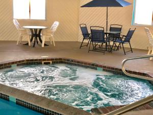 The swimming pool at or close to Super 8 by Wyndham Escanaba