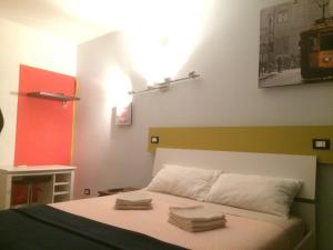 Voodi või voodid majutusasutuse Welcome B&B Lodi toas