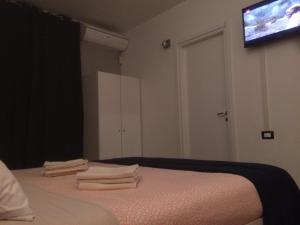 Voodi või voodid majutusasutuse Welcome B&B Lodi toas