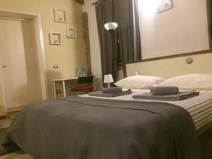 Voodi või voodid majutusasutuse Welcome B&B Lodi toas